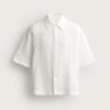 Chemise coton bio blanche à manches courtes motif gaufré, col classique, boutonnée sur l'avant