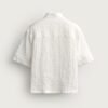 Chemise coton bio blanche vue de dos, texture gaufrée, manches courtes pour homme et femme