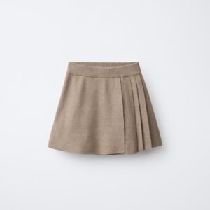 Jupe fille en lin naturel beige avec plis plats, taille enfant, look épuré pour été