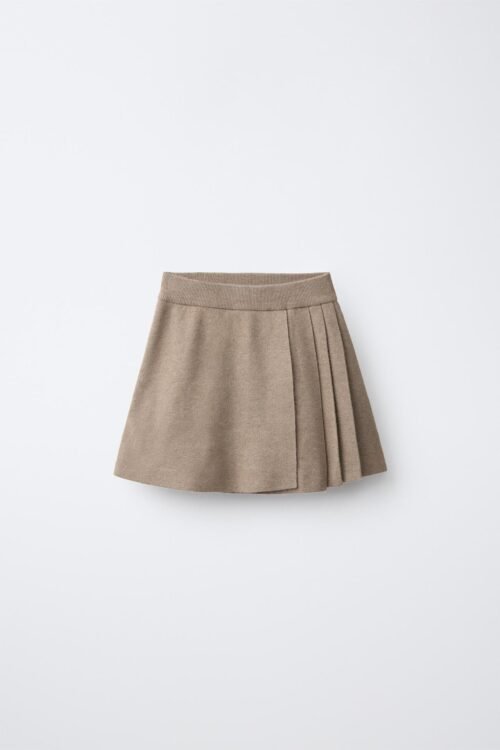 Jupe fille en lin naturel beige avec plis plats, taille enfant, look épuré pour été