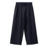 Pantalon garçon en coton bio noir taille enfant avec taille élastiquée, coupe droite et plis centraux