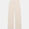 Pantalon en lin beige clair taille haute à jambe droite, vue produit sur fond blanc