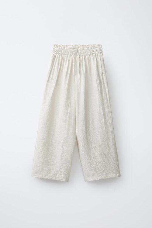 Pantalon fille en lin beige naturel taille enfant ceinture élastique et cordon, coupe droite estivale