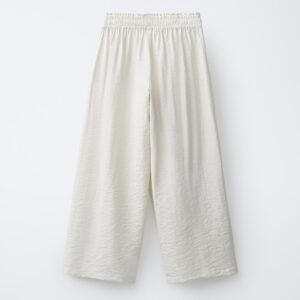 Pantalon lin beige fille taille élastique vue dos, tissu naturel léger pour enfant
