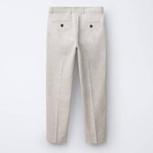 Pantalon garçon en lin beige naturel vu de dos, poches arrière boutonnées, taille enfant